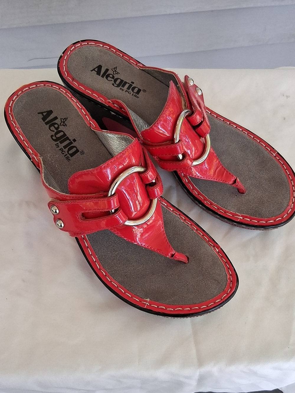Alegria Red Patent Leather Ring-Accent Thong Sandals
